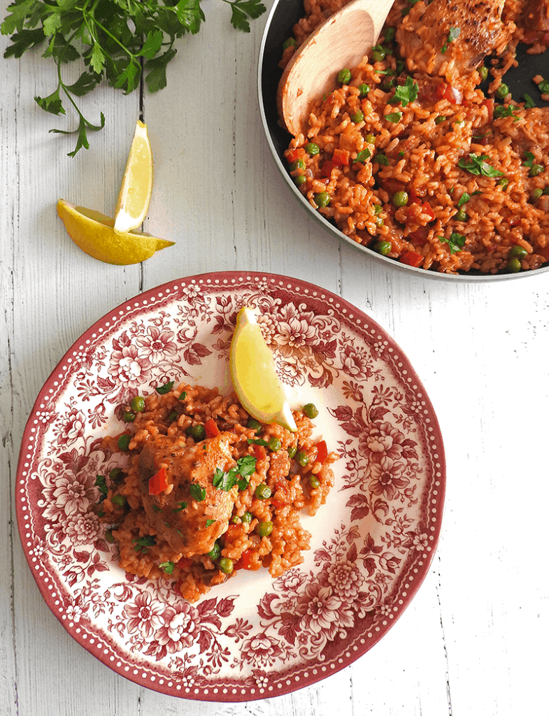 Chicken Chorizo Paella spooned onto a plate