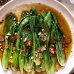 Pak choi with oyster sauce on a plate