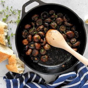 Garlic Mushrooms in a pan with some bread