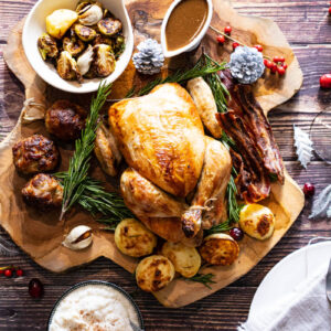 Christmas dinner for one on a wooden board