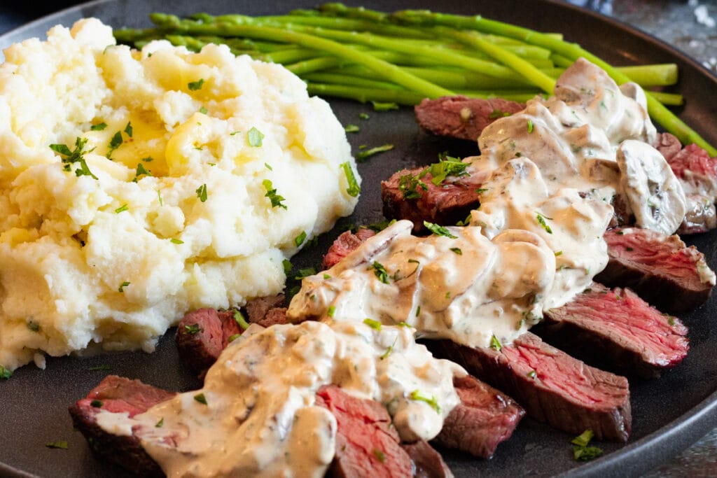 Closeup of steak with Diane Sauce