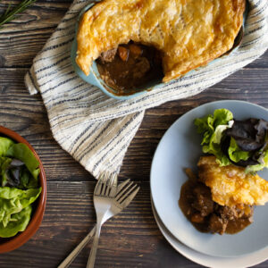 Slow cooker steak pie with a spoonful taken our