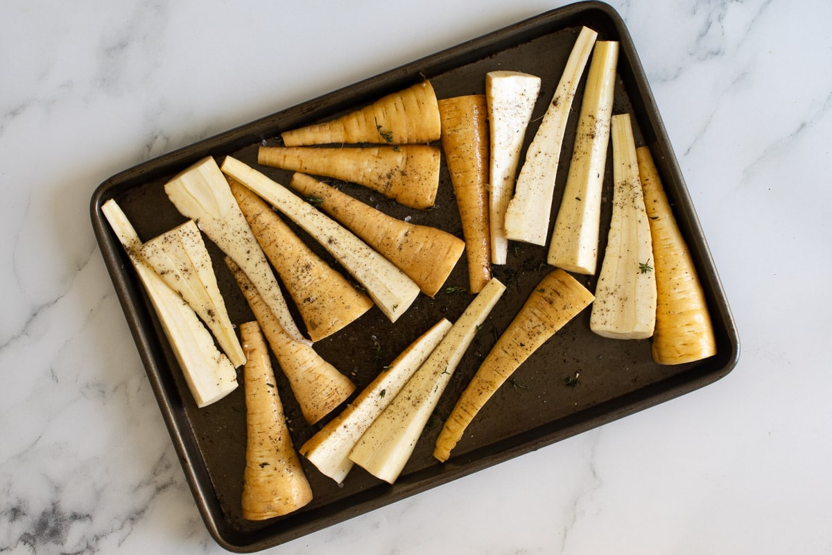 Roast parsnips with honey and oil drizzled over