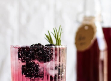 Blackberry gin drink on the counter
