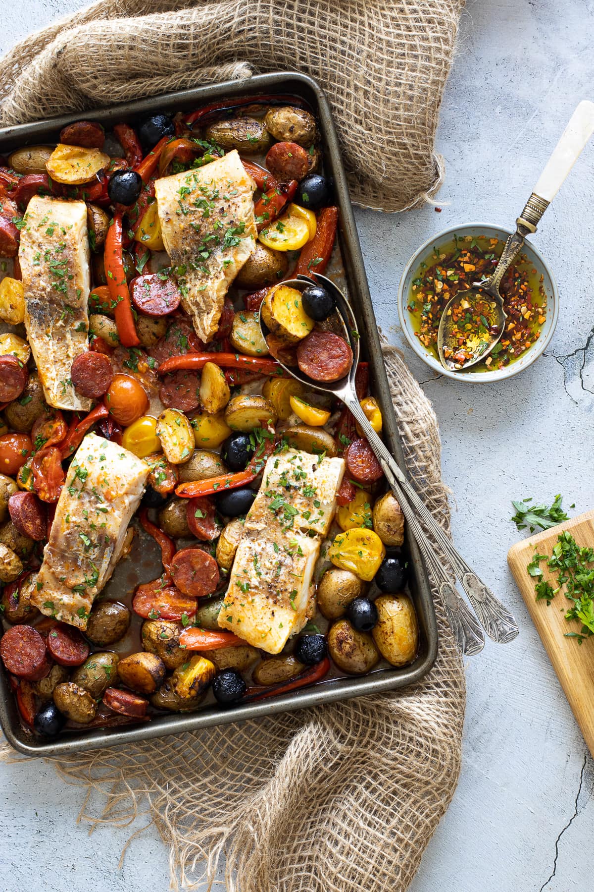 Cod and chorizo bake with chilli oil and parsley