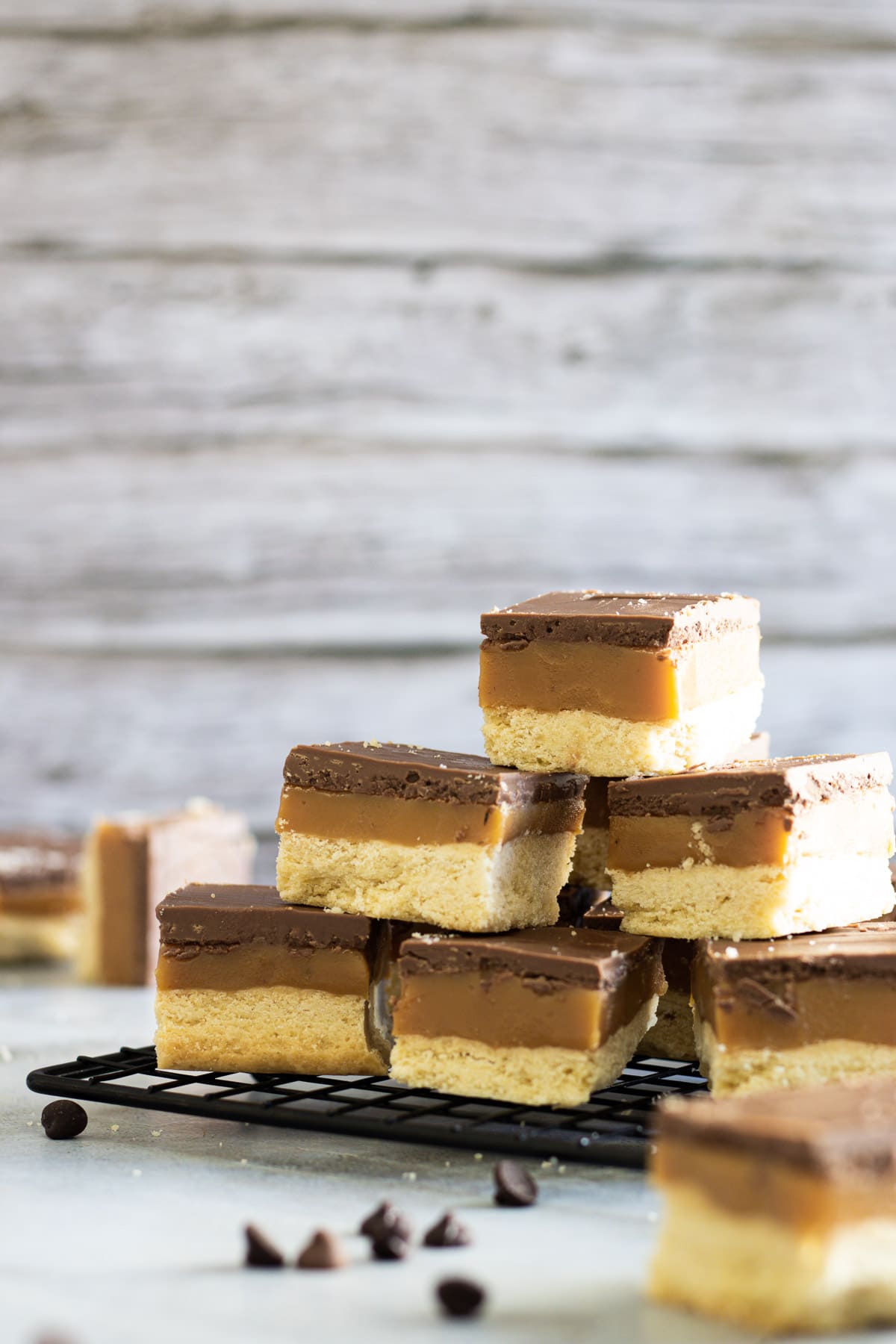 Millionaire's shortbread biscuits piled on top of each other